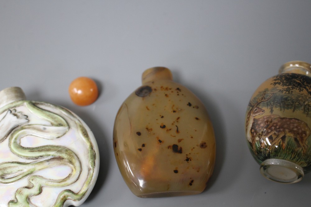 Two Chinese snuff bottles: agate and internally painted glass and a European porcelain scent flask